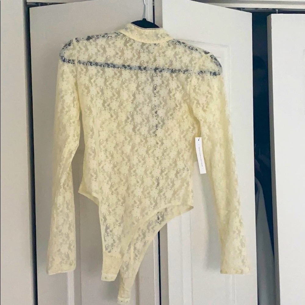 Lace bodysuit with tags